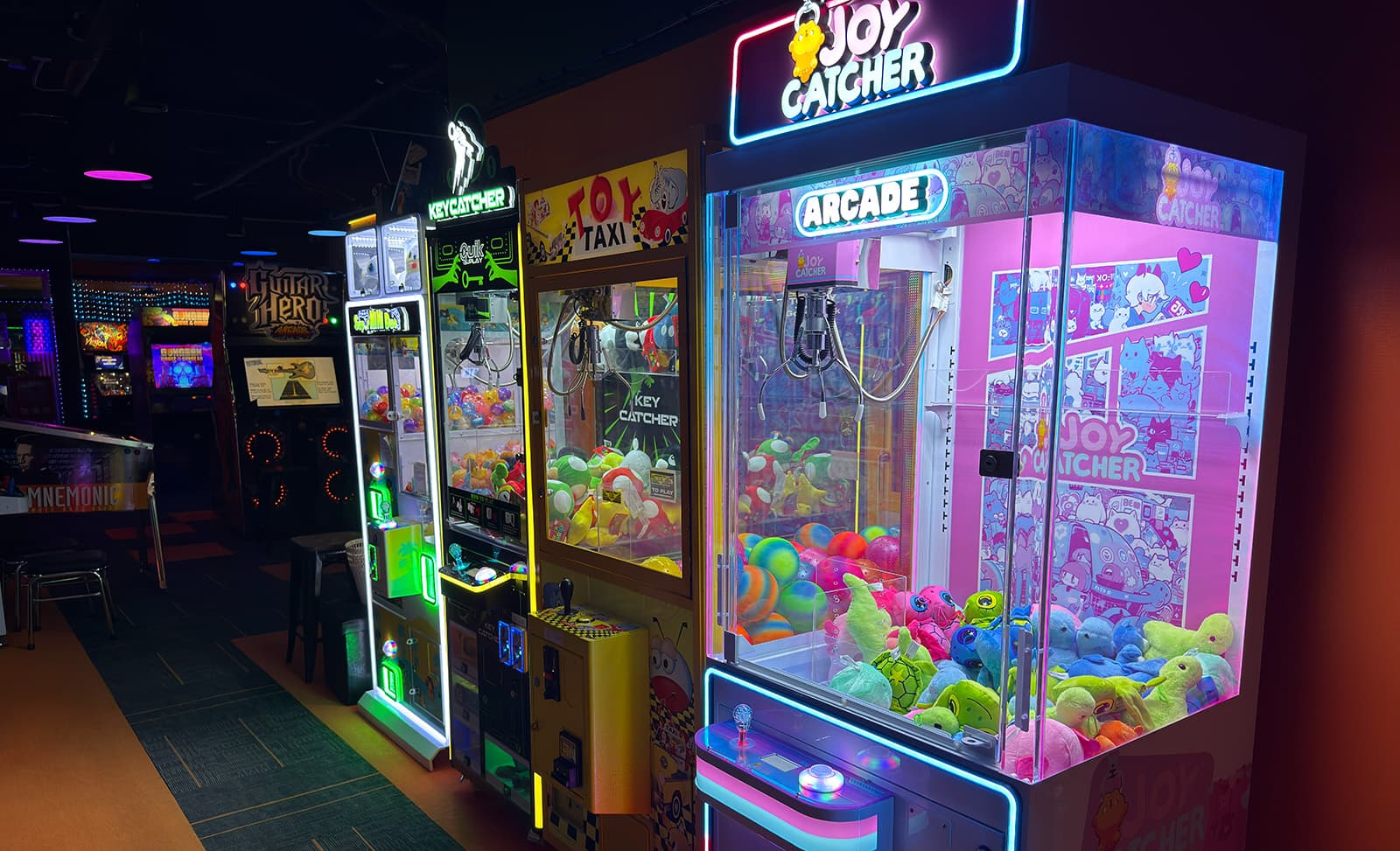 Claw machines glowing